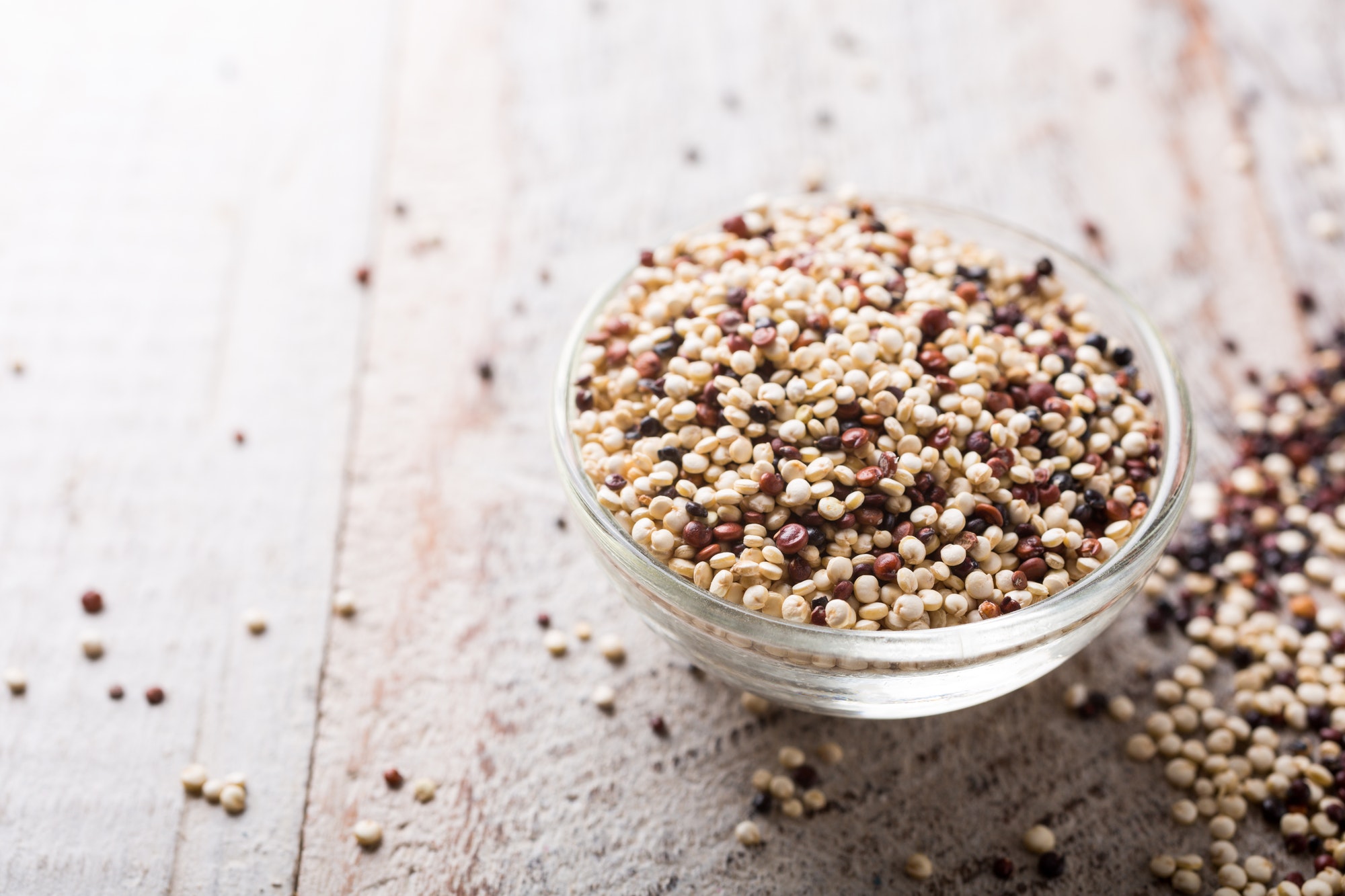 Pile of mixed raw quinoa