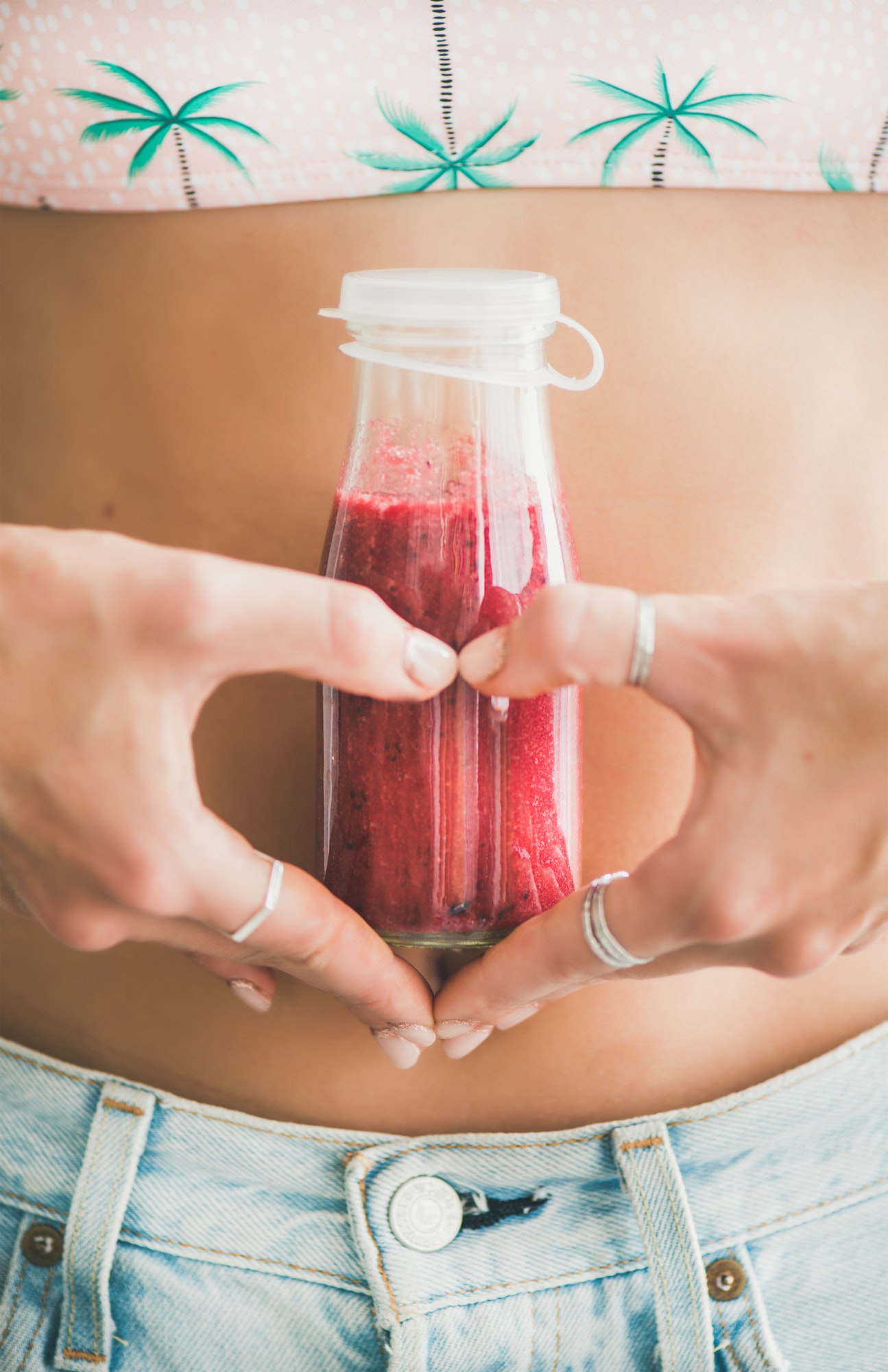 Winter seasonal smoothie drink detox in woman's hands